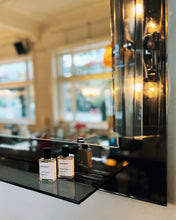 Load image into Gallery viewer, FONTANA ARTE / 1970s Gun Metal + Chrome Mirror w/ Smoke Glass Sconces
